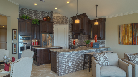 home kitchen featuring brick