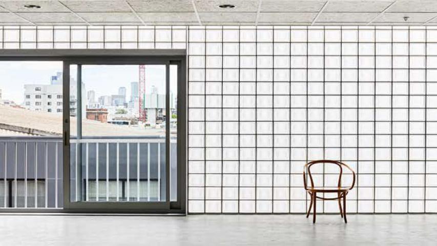 Property featuring glass block wall