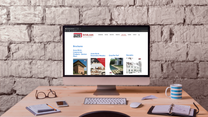 a computer on a desk with acccessories